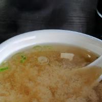 Miso Soup · Rich in seaweed tofu and green onion with dashi stock.
