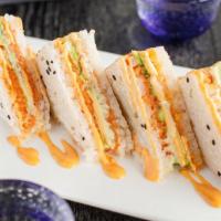 Sandwich Roll (4) · Spicy salmon, spicy tuna and avocado wrapped with sesame soy paper served with spicy mayo an...