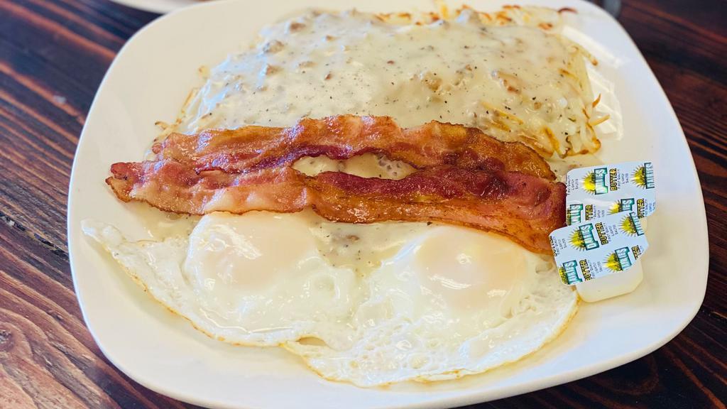 Matt’S Country Gravy Platter  · 2 eggs, hash brown, country gravy, bacon, and
belgian cinnamon waffle