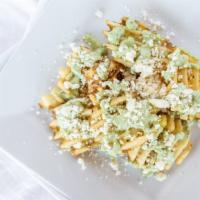 Greek Fries · Waffles fries, covered with basil garlic sauce and feta cheese.