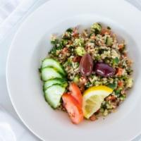 Whole Wheat Tabouli · Traditional Mediterranean salad which combines whole wheat grain, parsley, cucumbers, olive ...