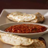 Greek Cheese Bread · Feta, mozzarella, garlic and oregano on garlic bread served with marinara sauce.