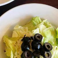 Garden Salad · Fresh greens, mozzarella, black olives and your choice of dressing
