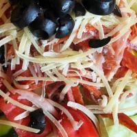 Antipasti Salad · Fresh greens, salami, pepperoni, Canadian bacon, tomatoes, cucumbers, black olives, Parmesan...