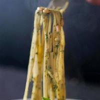 Pesto Linguine · Garlic and our basil pesto sauce and Parmesan.