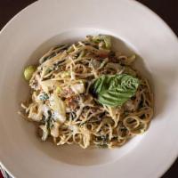 Pasta Bella · Italian pancetta, celery, basil, garlic, onions sauteed in a cream sauce, tossed with spaghe...
