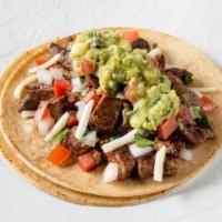 Taco A La Carte · One taco, served à la carte, with choice of tortilla and toppings. Guac is on us!