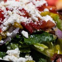Full Greek Salad · Crisp Romaine Lettuce, Red Onion, Pepperoncinis, Kalamata Olives, Tomatoes and Feta Cheese. ...