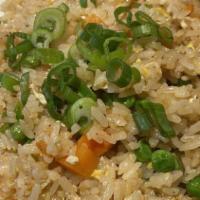 Shrimp Fried Rice · Shrimp with minced garlic, peas & carrots, white onions, topped with green onions and sesame...