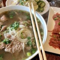 (Steak) Phở Tái · Steak (This item is rare steak meant to be cooked as the hot broth is poured over the meat) ...