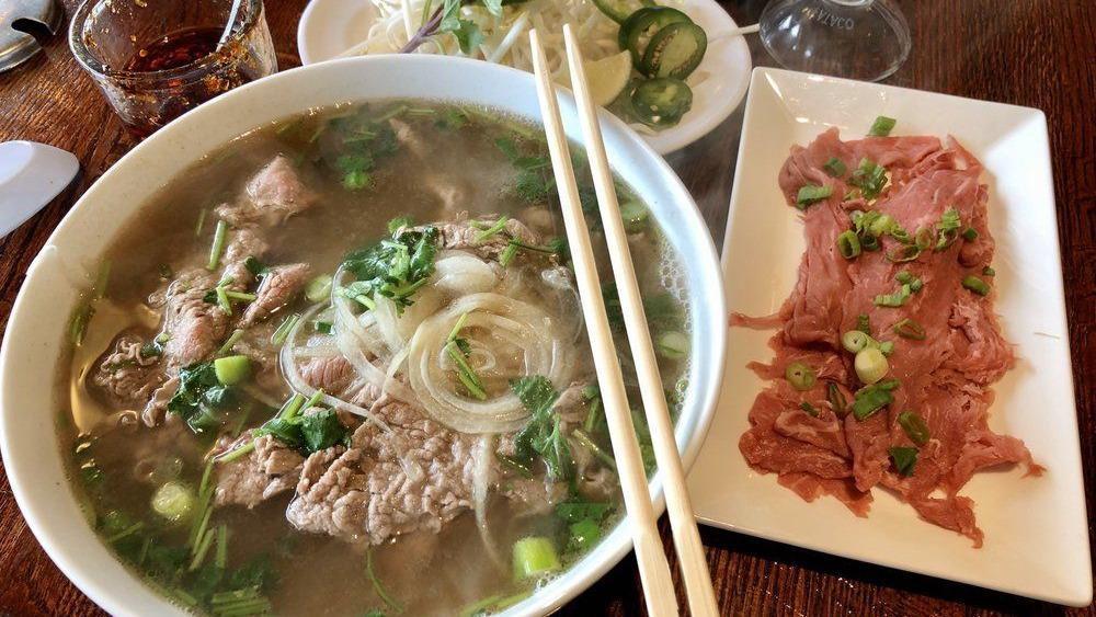 (Steak) Phở Tái · Steak (This item is rare steak meant to be cooked as the hot broth is poured over the meat) 

Consuming raw or undercooked meats, poultry, seafood, shellfish, or eggs may increase you risk food borne illness. Eggs are cooked to order, soft yolk eggs may increase
your chance of foodborne Illness.