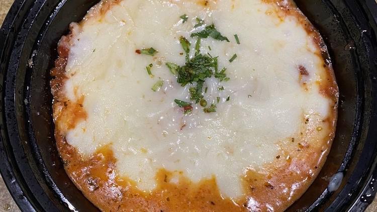 Vegetarian Lasagna
 · Vegetarian. Homemade vegetable lasagna with bushemel Sauce baked in our brick oven and topped with fresh parmesan cheese. Contain gluten and dairy.