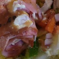 Antipasto Salad · Lettuce, tomato, onions, green peppers, ham, salami, provolone.