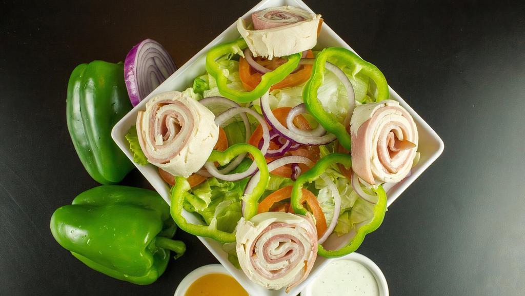 Chef'S Salad · Lettuce, tomato, onions, green peppers, ham, turkey, provolone.