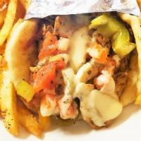 Chicken Fajita Hot Only · Served in a pita bread, with green peppers, tomato, onion, jalapenos and american cheese.