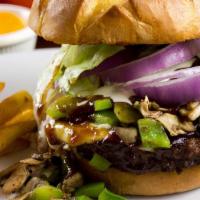 Verdi Texas Burger · Served with bbq sauce, ranch dressing, green peppers, mushrooms, lettuce, onion, american ch...