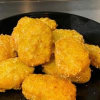 Chicken Nuggets · All-white meat chicken nuggets, fried until golden.