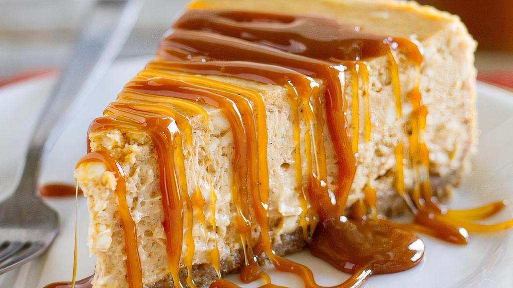 Dulce De Leche Cheesecake · Smooth, creamy perfection on a sinful graham cracker crust and topped with a luscious dulce de leche sauce.