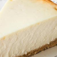 New York Cheesecake · Smooth, creamy perfection on a sinful graham cracker crust.