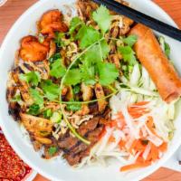 Combination Vermicelli Noodle Bowl · Served with Grilled Pork, Grilled Beef, Grilled Shrimp, Grilled Chicken, AND Egg Rolls