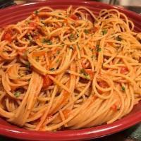 Spaghetti Pomodoro · Fresh spaghetti with marinara sauce and Parmesan cheese.