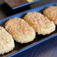 Croquette (4 Pc) · Deep-fried panko mash potato filling in 4 different flavors. Vegetable, Curry,  Pumpkin and ...