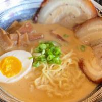 Miso Ramen (Pork) · Pork broth flavored with miso base. Served with medium-thick wavy noodles, 2 slices of pork ...