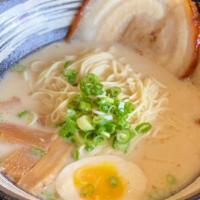 Light Tonkotsu Ramen · Mix of creamy milky flavored pork broth and chicken broth. Served with thin noodles, 2 slice...