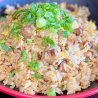 Pork Fried Rice · Stir-fried rice with onions, green onions, egg and chopped chashu pork.
