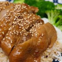 Teriyaki Chicken Bowl · Chicken thigh with skin slow cooked in a teriyaki sauce. Served with rice and steamed brocco...
