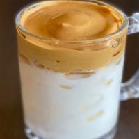 Iced Whipped Coffee · Half and half topped with whipped coffee and sugar mix. 16 oz