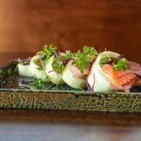 Sashimi Roll · Crab stick, salmon, tuna, yellowtail, snapper, avocado, radish sprout, gobo wrap with cucumb...