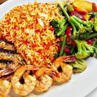 Seafood Delight · A platter of delightful seafood consisting of prawns and grilled Alaskan salmon served with ...