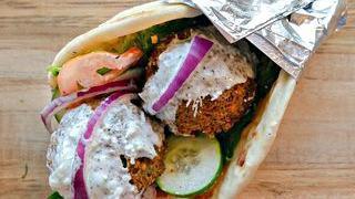 Falafel Sandwich · A healthy vegetarian sandwich which contains deep fried ball made with ground chickpeas, fav...