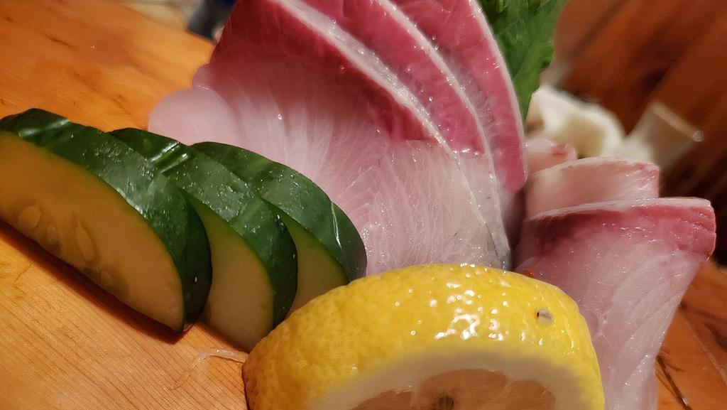 Hamachi Sashimi · Raw Yellow tail .
Consuming raw or undercooked seafood or shellfish may increase your risk of food-borne illness.