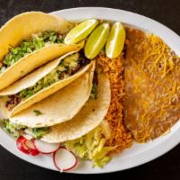 Taco Plate · Choice of meat asada, pollo, pastor, carnitas, tripa, and lengua.