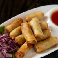 Spring Rolls · This item contains wheat and soy bean. Fried spring rolls stuffed with cabbage, green beans,...