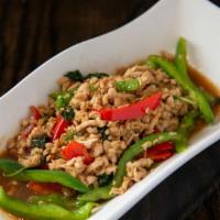Pad Ka Prau · This dish features your choice of ground chicken, pork or beef stir-fried with basil and bel...