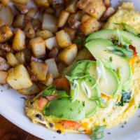 Blue Spring Omelette · Blue cheese crumbles, cheddar cheese, spinach & mushrooms.
Topped with avocado, tomato and g...