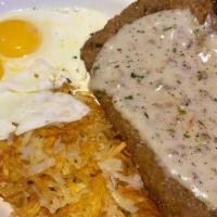 Country Fried Steak & Egss · Twelve-ounce chicken fried steak served with two eggs any style, toast and
choice of country...