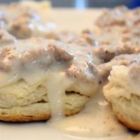 Biscuits & Gravy · Country gravy over fluffy biscuits. Choice of bacon sausage or ham.