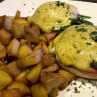  Spring Benedict · Sliced ham, spinach, two poached eggs and pesto- hollandaise
sauce on English muffin and sid...