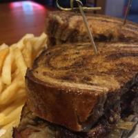 Patty Melt · Hamburger patty served on grilled rye bread with 1000 island, grilled
onions, Swiss cheese &...