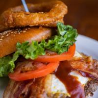 Hangover Burger · Lettuce, tomato, onion ring, fried egg, smoked bacon, tillamook
sharp cheddar cheese & BBQ s...