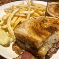 Reuben · Pastrami smothered with sauerkraut & Swiss cheese served on grilled
rye bread with 1000 isla...