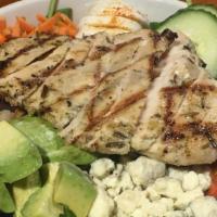Cobb Salad · Smoked chicken, bacon, carrots, cucumbers, avocado, hard boiled
egg, tomatoes & blue cheese ...