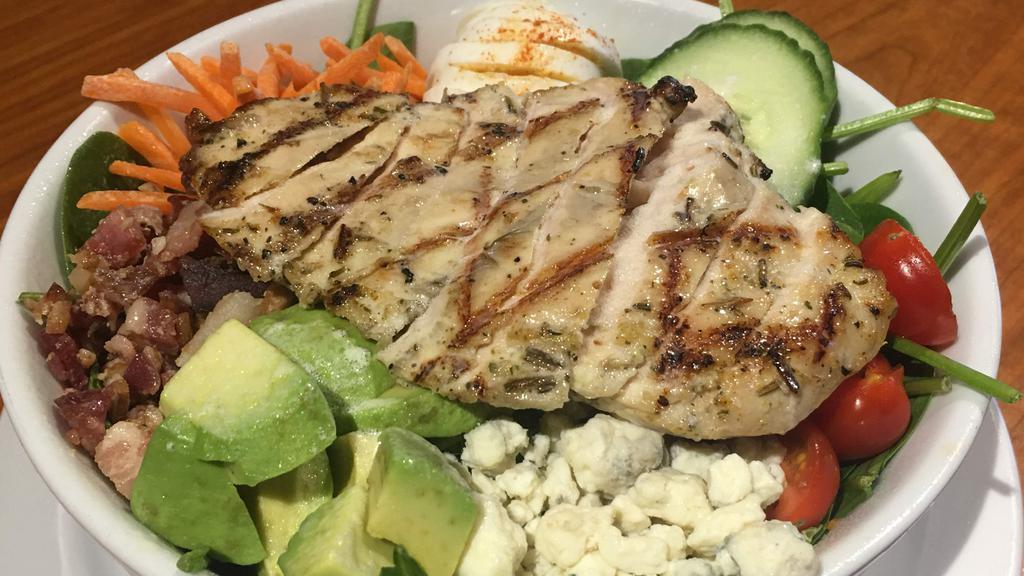 Cobb Salad · Smoked chicken, bacon, carrots, cucumbers, avocado, hard boiled
egg, tomatoes & blue cheese crumble.