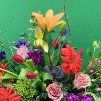 Designer'S Choice Standard · Our most popular choice! A unique arrangement made by our floral artisans using the freshest...