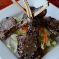 A2 Grilled Lamb Chops · Spicy. Marinated and grilled to perfection, served over spicy cabbage.