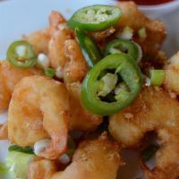 Salt & Pepper Shrimp · Lightly battered, golden fried shrimp tossed with salt and pepper, served with sweet chili s...